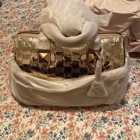 NWT Michael Kord Metallic Satchel
Gold
Never Used - Picture 2 of 9